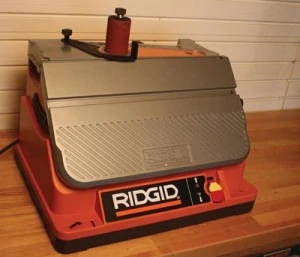 The Ridgid EB4424 works as an oscillating belt sander and features on-tool accessory storage.