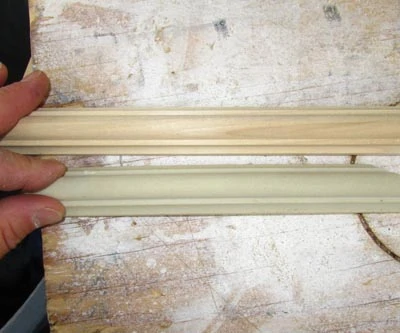 The flexible molding matches the standard wood molding exactly but costs three times the price. For this reason, we used wood molding on the vertical pieces that didn't need to bend. 