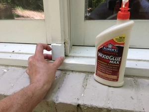 Glue and/or nail the replacement carefully into the void. Use an exterior-grade wood glue or construction adhesive. 