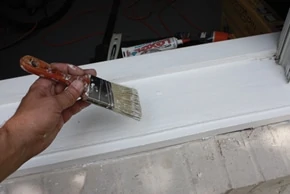 All repairs should be caulked, primed and painted to match the existing casing. 