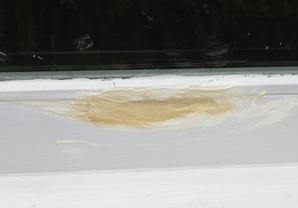 Build up coats of Water Putty until the damaged area is filled just above the surface. Once dry, it can be sanded, primed and painted. 