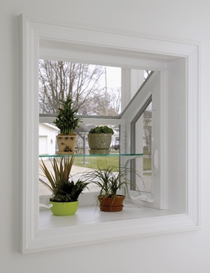 A Garden window extends the space outwards from the window with shelves that allow room for plants or other items. 