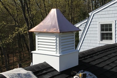 Bring the cupola to the roof and test the fit. 