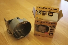 The new metal ceiling fan box came with a right-angle bracket for mounting from the side. 
