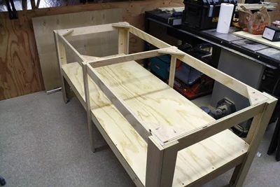 Here’s an example of a custom-built assembly table (no top yet).