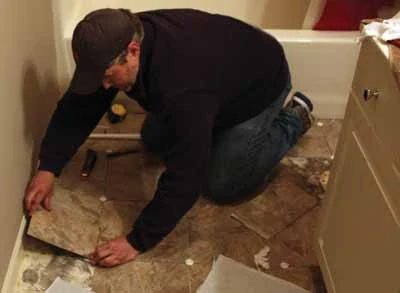 Tiles along the walls will often have to be cut to fit. 