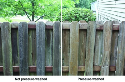 After the fence dries from the washing, it becomes evident how much dead wood and grime pressure-washing can remove. 