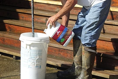 Super Deck Exterior Cleaner concentrate is used to clean the wet areas.
