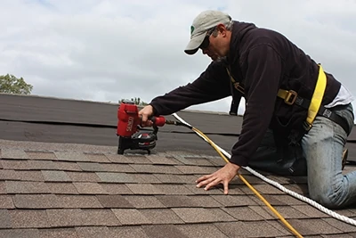 A fall-restraint safety harness should be used when working on the roof. 