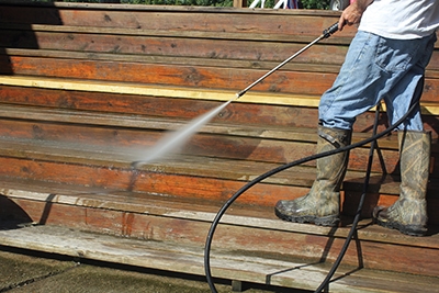 The deck and steps are lightly power-washed. 