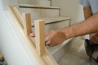 We used the end cuts from a new balusters to test the baluster layout by standing them in the shoe rail.