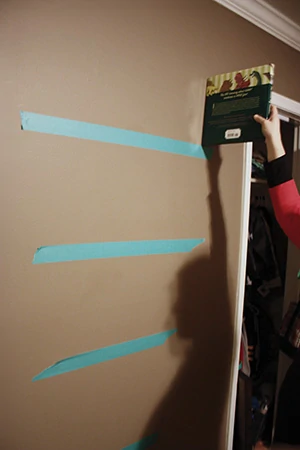 My wife and I used painter’s tape to represent the shelf locations as we experimented with placement. 