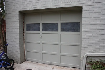 The goal of this project: Replace the overhead garage door with a double door so the interior can be remodeled as a family room.