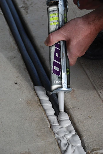 Any crack that's deeper than 1/2" and wider than 1/4" needs backer rod so the caulking will properly stretch, and so you use less caulking. ON this repair Sashco's Filler Rope is used to fill a joint in a concrete driveway Sashco's Slab concrete repair caulk is applied over the rod. The bead should be at least 1/4" thick but no more than 1/2" thick to allow it to stretch correctly (too thin and it'll tear, too thick and it'll be too rigid). 