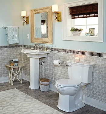 Modern bathroom trends include pedestal sinks, low-flow toilets, floating vanities and open shelving. 