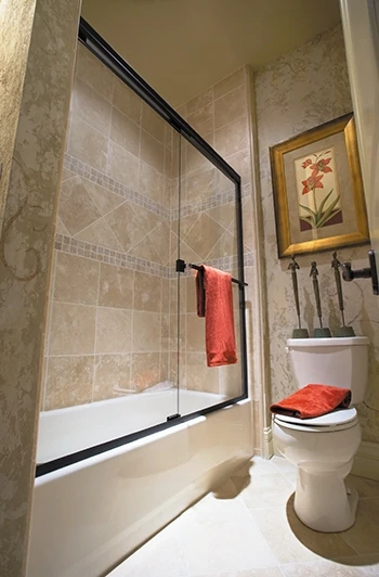 Glass shower enclosures are a popular design trend because they give the bathroom a spacious, luxury spa-like feel. 