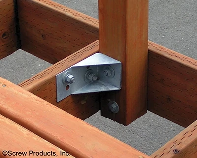 The DeckLok Lateral Anchor System provides shear suport to railing posts by connecting to the deck joist. 