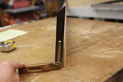Use an angle gauge to measure the bevel. 
