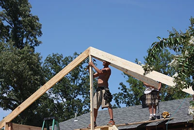 Temporary support braces are used to keep framing components in place while the roof-build continues. 
