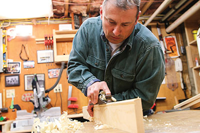 Remove any mill marks from the router with a block plane. 