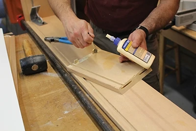 Apply quality wood glue to all corner joints. 