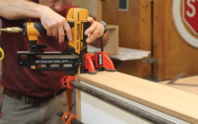 Finish nails help close the corners during glue-up. 
