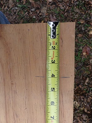 With the top of the plywood representing the top of the R.O., measure down to the desired top of the arch and mark its "thickness" along each side. 