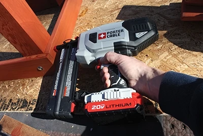 I shot finish nails into the side of the legs to hold them square while the glue dried. This cordless finish nailer from Porter-Cable made the job a snap. 