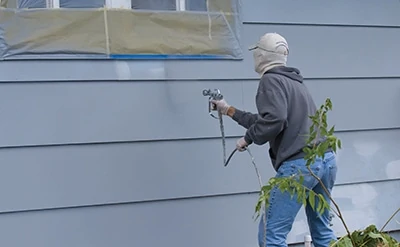For large projects such as painting house siding, an airless sprayer can speed up the process while achieving a very smooth, even finish. 