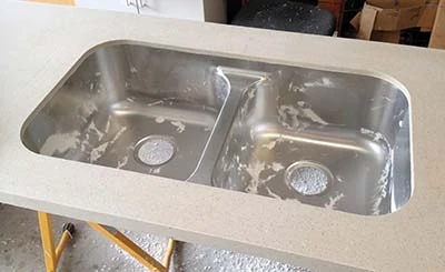 A succesful installation of the sink is simplified by the added solid surface ring applied to the top of the sink by the manufacturer. 