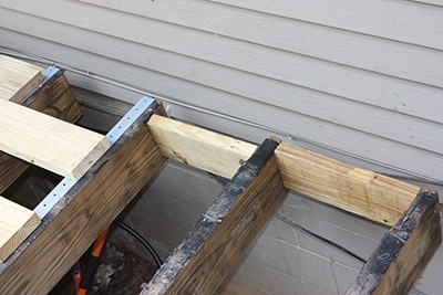 We installed blocking between the cantilevered joists ends to prevent them from twisting over time. 