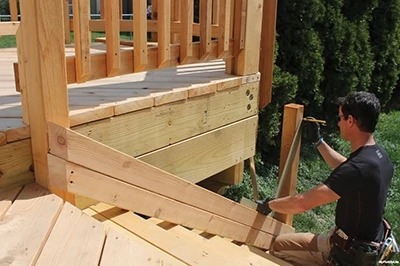 Stacked 2x4 and a framing square are your best friends for laying out a stair rail. 