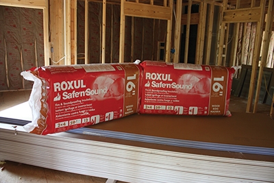 The Roxul Safe N' Sound product comes in ready-to-install stone wool batts that each measure roughly 3" thick. 