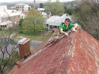 When working on a roof, always wear fall-restraint safety harness. 
