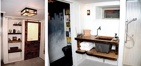 A sink vanity and shelving made of reclaimed lumber maintained the rustic decor of the man-cave bathroom.