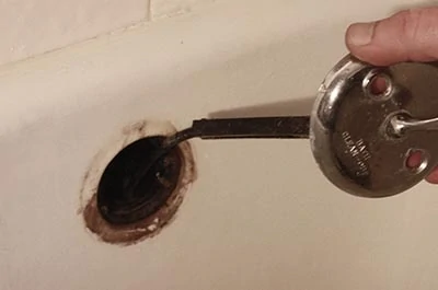 How to Fix a Leaky Bathtub Overflow Tube