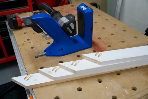 kreg jig next to mitered joints with pocket holes