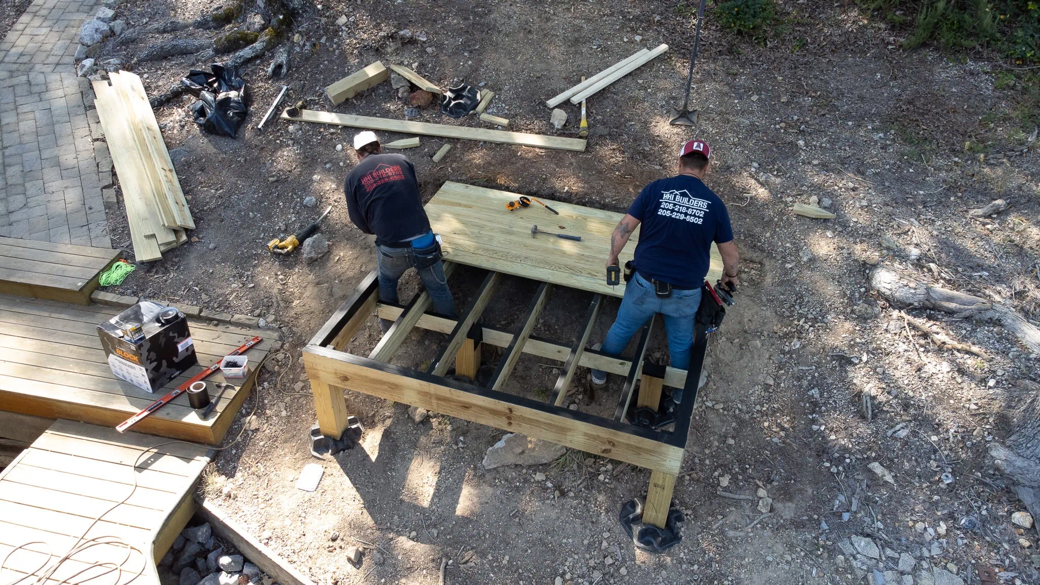 Decking over joist taped frame