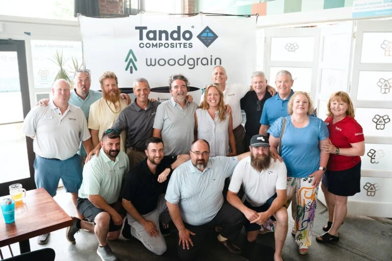 The team from Tando Composites and Woodgrain at kick-off event with the stars of TV's Maine Cabin Masters.