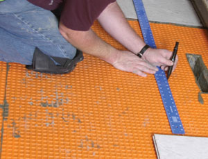 Lay out the floor tile.