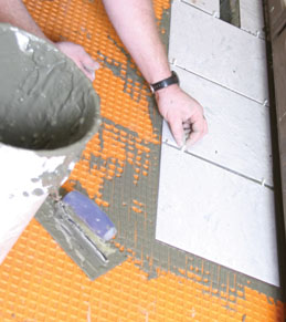 Tile is set in the same manner as for other underlayments, except the thinset mortar is mixed a little thinner.