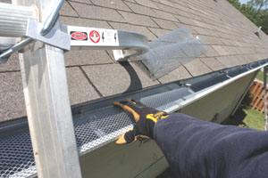 Gutter covers prevent debris accumulation that can lead to ice dams during winter.