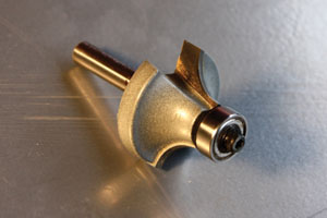 A round-over bit is shaped to ease the edge of wood stock, which made the edge of the frame less susceptible to nicks and dents. 