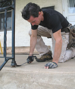 A plan is the key to the kingdom. Before starting, thoroughly inspect the structure. For cast iron railings, for example, I pry up the escutcheon to check for decay.