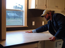 how to install laminate sheet on curved countertop