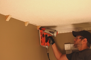 Nail the blocks into the wall studs.