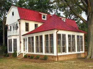 A house with a metal roof that interlocks