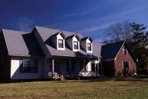 A house with a light-colored steel roofing